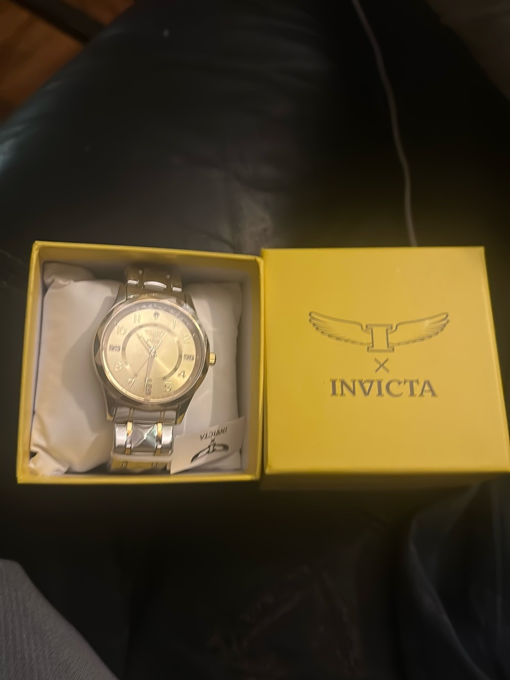 Invicta Men’s Silver and Gold-Tone Bracelet Watch